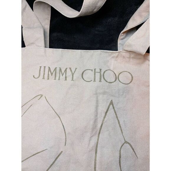Canvas Jimmy Choo clothing tote in Excellent condition.